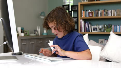 -Happy-son-using-computer-