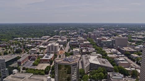 greenville south carolina aerial v5 tracking shot flying alongside with high rise buildings capturing low rise downtown cityscape in daylight - shot with inspire 2, x7 camera - may 2021