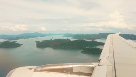 breathtaking view from a plane window, showcasing a stunning aerial perspective of an island below