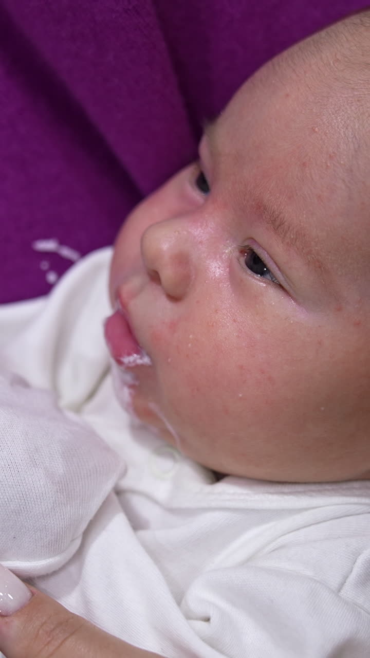 Close-up of a baby feeding