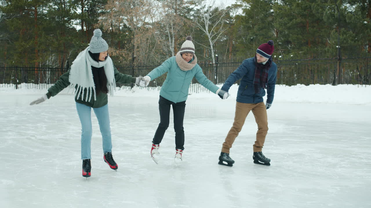 Friends Ice Skating in Winter
