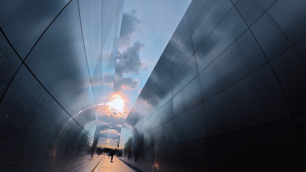 Jersey City, USA, 1 July 2025: Looking at the cloudy sky among the metal walls. Inside the Empty Sky memorial in New Jersey, USA