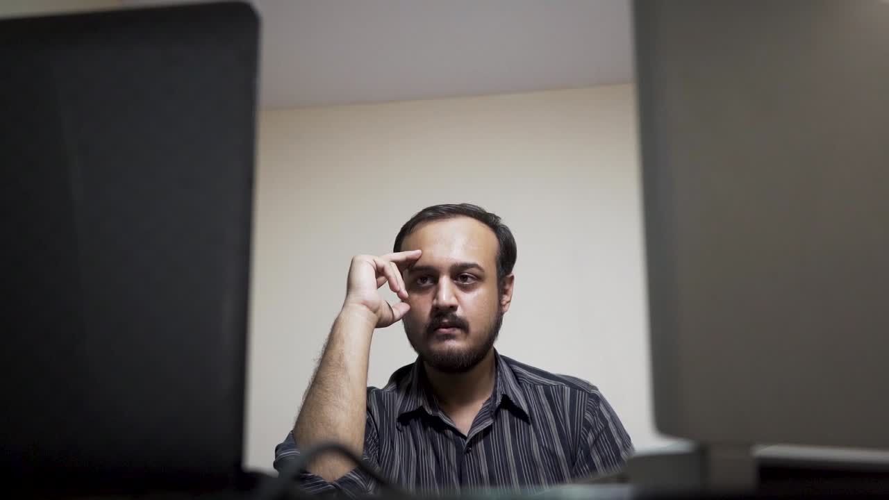 depressed and exhausted man in the office