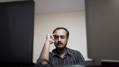 depressed-and-exhausted-man-in-the-office