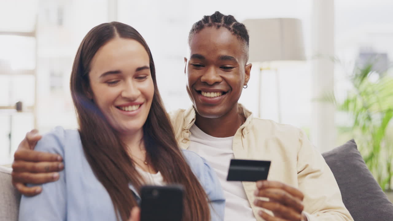 Phone, couple and credit card for online shopping