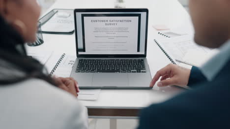 laptop screen, man and woman on online survey