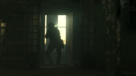 silhouette of a soldier in a ruined building
