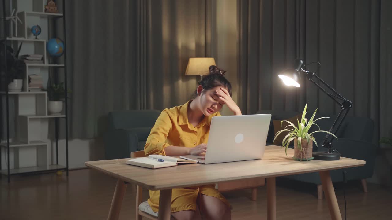 Tired Teenage Girl On The Table At Home Working Over Night