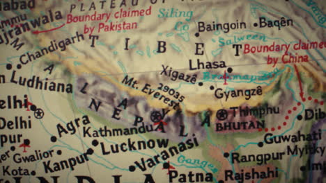 close-up of a political map showing india, nepal, tibet, and mount everest