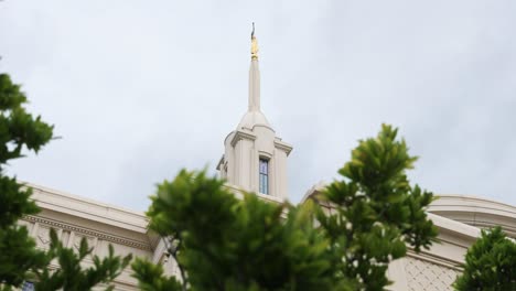 Moroni-on-Steeple-of-LDS-Mormon-Temple-in-Bountiful,-Low-Angle