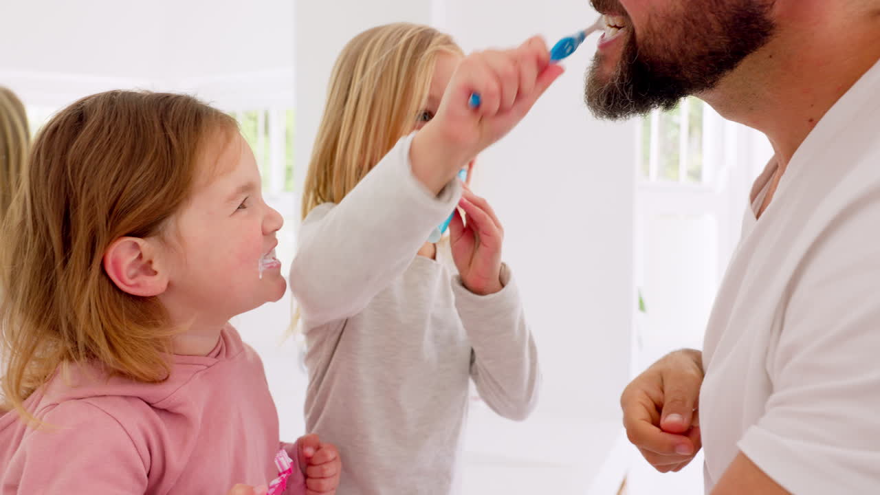 Children Brushing Teeth with Dad