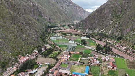 aerial drone view of ollantaytambo inca city town in peru mountains and inca ruins