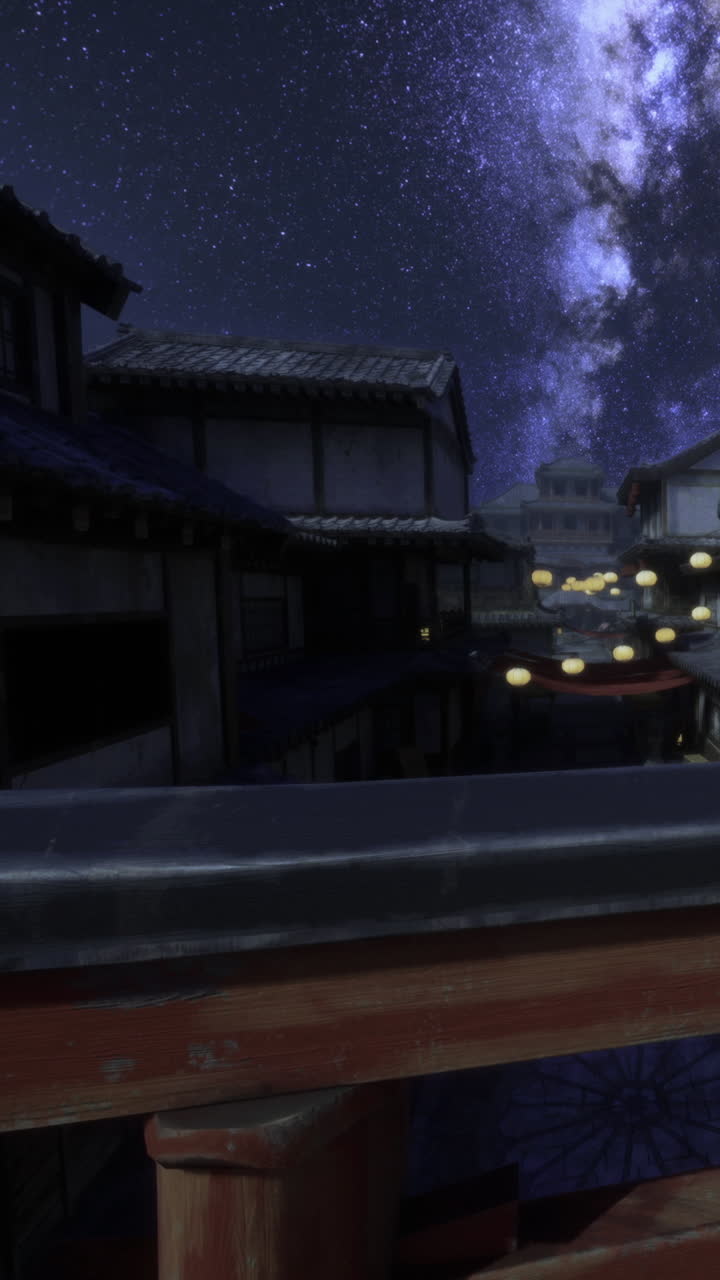 星と街の明かりが輝く静かな町の夜景。