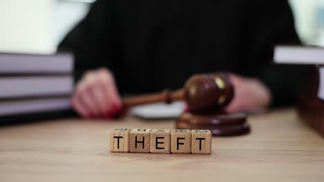 theft and tax law concept with gavel and wooden blocks