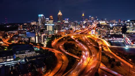 atlanta night drone hyper-lapse, midtown, push-forward reveal shot