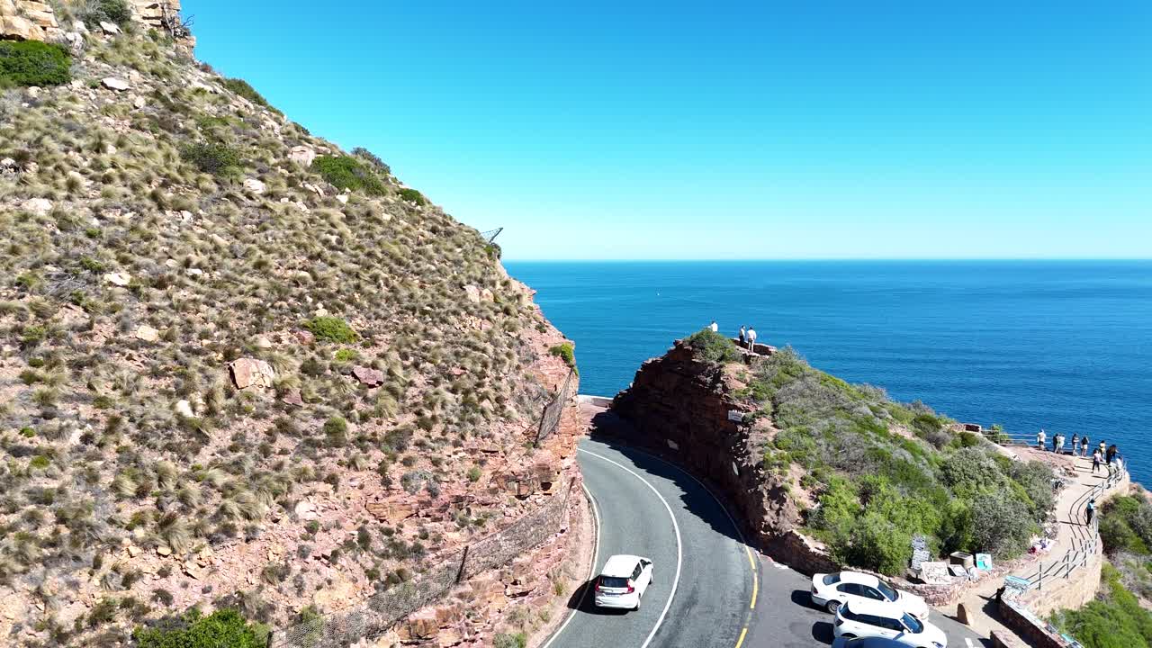 aerial view of car driving along Chapman's Peak Drive Chappies, a spectacular 9km winding route in Cape Town South Africa