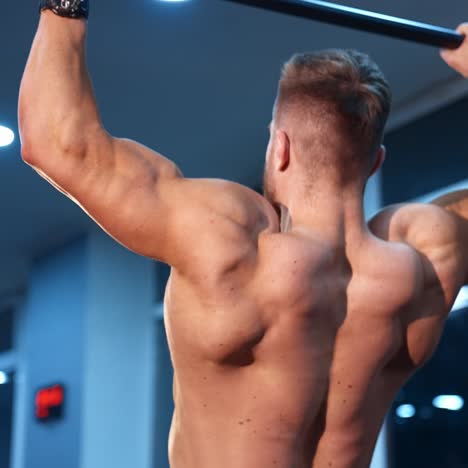 man doing exersices on horizontal bar