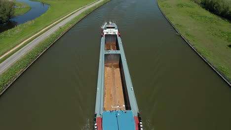 An-Empty-Barge-Boat-Sailing-In-The-Calm-River-Of-Gouwe-In-Zuidelijk-Halfrond-Zone,-South-Holland,-Netherlands