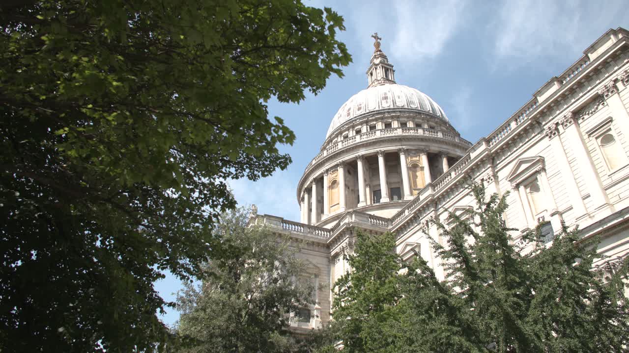 Static shot of St. Paul's Cathedral framed by trees