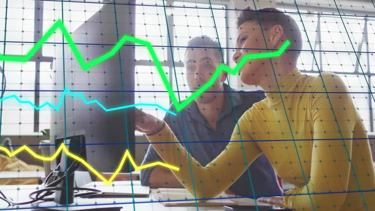 Woman pointing at monitor, starting charts on grid matching gestures, man analyzing business trends