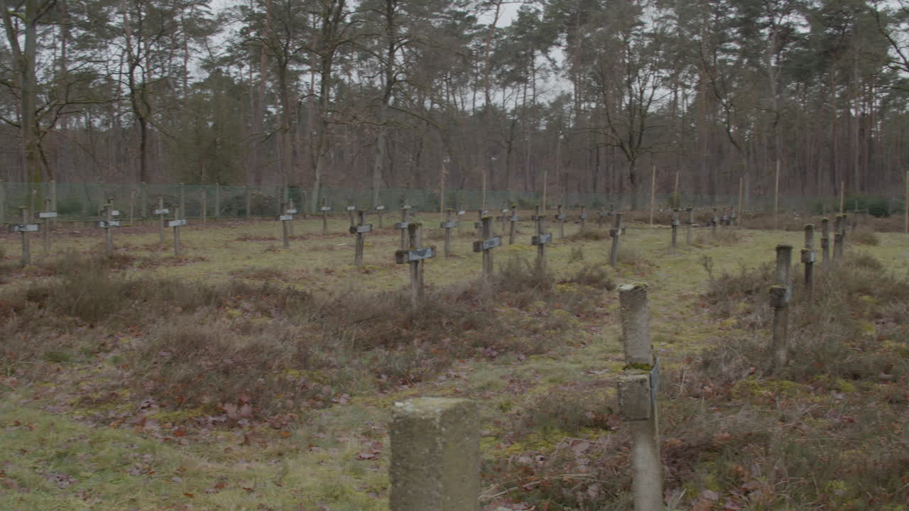 Pan over old gravestones at graveyard