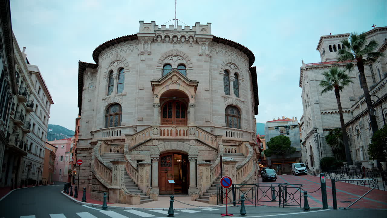 Monaco City, Monaco - September 4, 2024: The facade of the Palace of Justice and the Monaco Cathedral in the Old Town in the evening