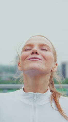 a journey of serenity: captivating moments of a young woman embracing tranquility against a modern urban backdrop