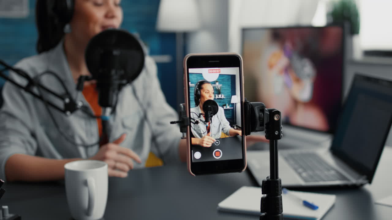 Friendly internet live show host talking to audience