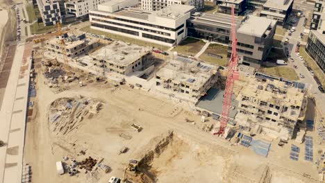 busy construction site and construction equipment aerial