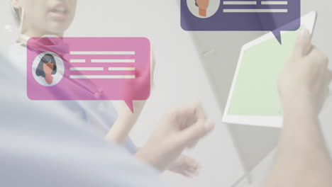 medical chat bubbles animation over healthcare professionals using tablet
