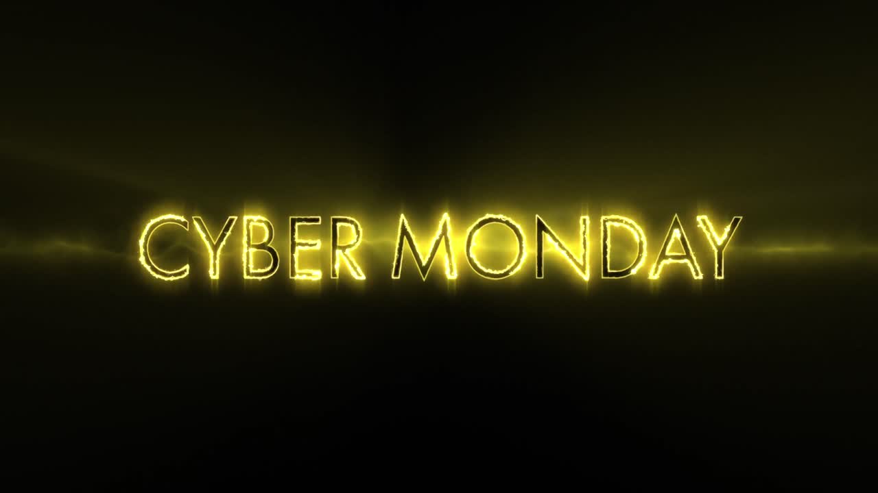 texto de cyber monday amarillo de neón que aparece contra una pantalla negra 4k