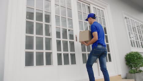 delivery person delivering package at home