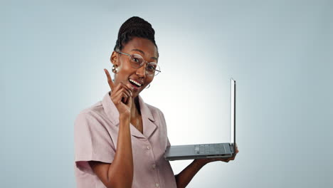 Laptop,-smile-and-thinking-with-a-black-woman-user