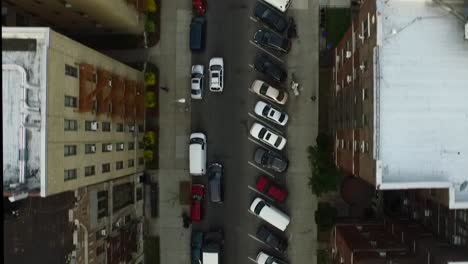 Overhead-aerial-view-cars-driving-on-Brooklyn-streets-of-New-York-City-NYC-4K