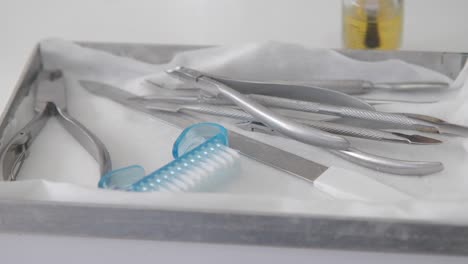 manicure and pedicure tools in a tray