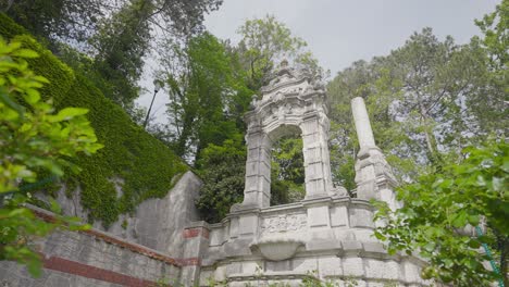 ornamental stone archway in a park