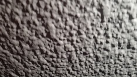 slow motion texture of concrete sludge plaster moving down, very cool effect for overlay or transitions