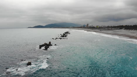 Aerial-drone-shot-of-beach-and-Hualien-County-near-Nanbin-Park-Taiwan