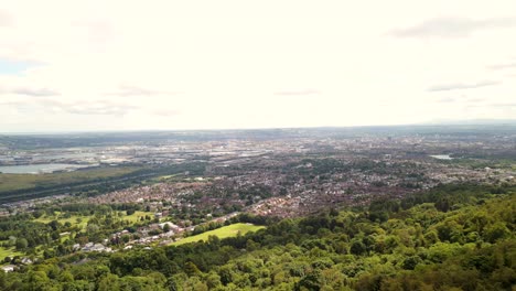 Aerial-shot-of-Belfast,-filmed-from-Cavehill,-Northern-Ireland-on-a-sunny-day