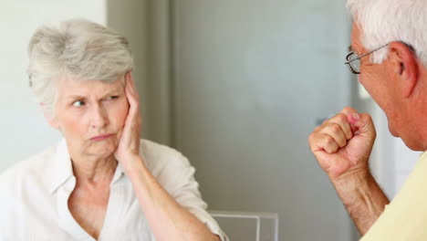 Senior-couple-playing-cards-at-the-table