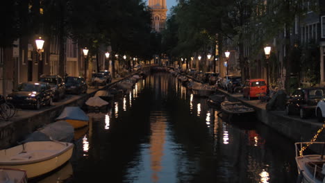 evening amsterdam with canal and zuiderkerk