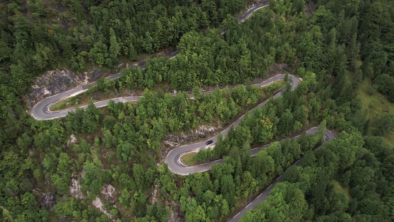 Vrsic pass winding road aerial panoramic view, Julian Alps nature, Alpine landscape scenery