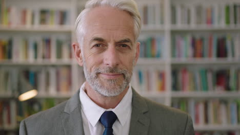 portrait of professional businessman in library smiling gentleman architect professor lecturer