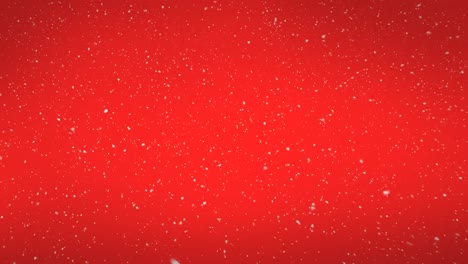 Animation-of-snow-falling-over-red-background-at-christmas