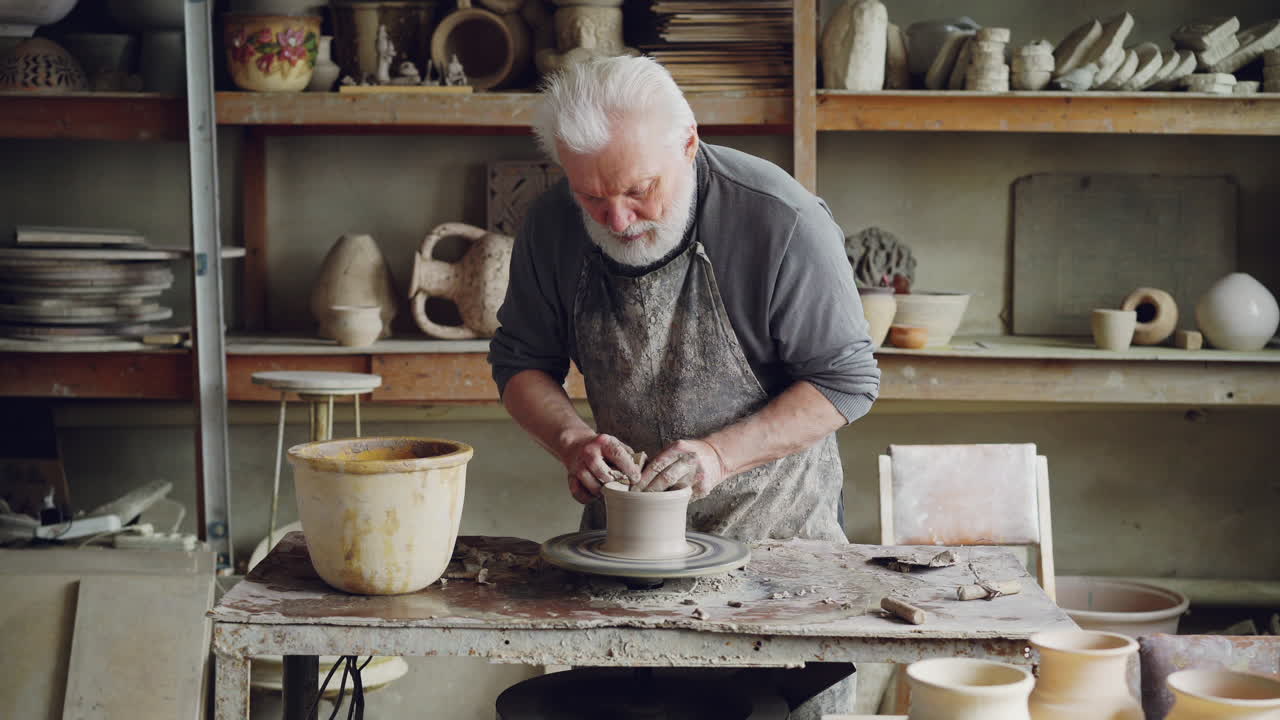 Senior Potter at Work in a Workshop