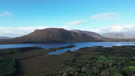 An-aerial-of-the-stunning-mountains-and-waters-of-Connemara-Loop-on-a-clear-day,-Galway-County,-Ireland