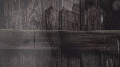 Animation-of-interference-over-wooden-background