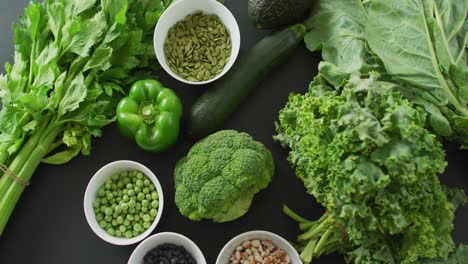 video of green fresh vegetables with copy space over green background