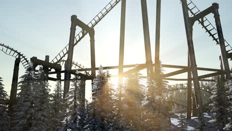 old roller coaster at sunset in forest