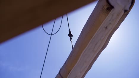 lifting a wooden beam